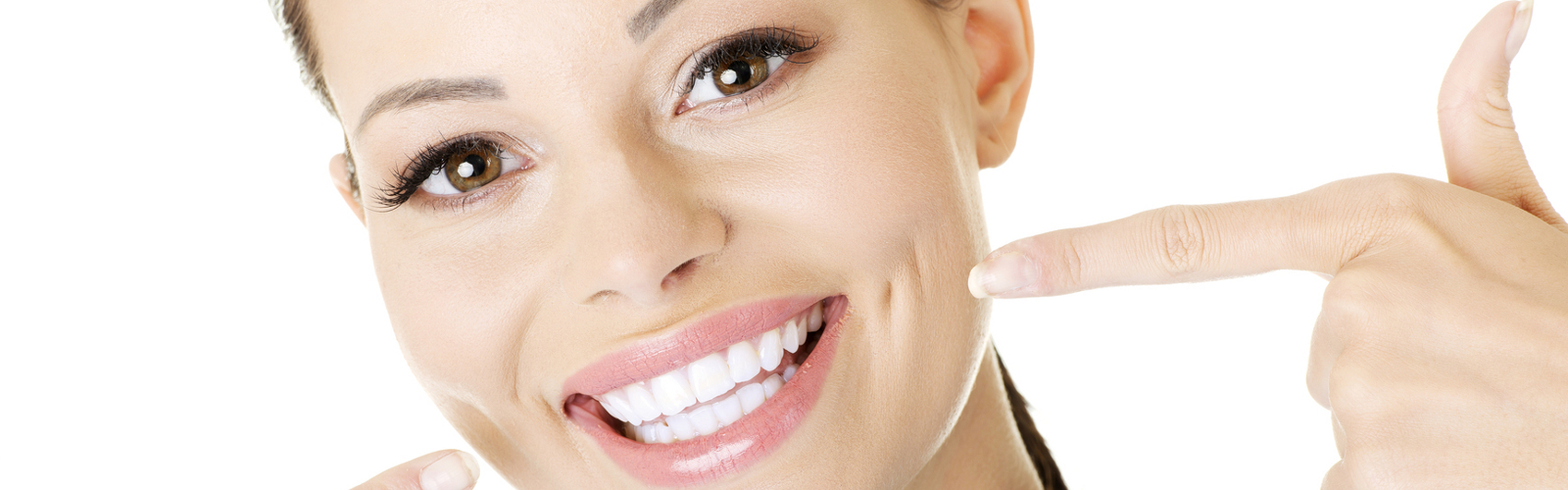 Woman showing her perfect straight white teeth.